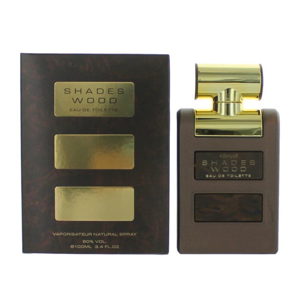 Parfümflasche und Verpackung. Braune Flasche mit goldenem Verschluss. Aufschrift: SHADES WOOD. Verpackung mit goldenen Rechtecken.