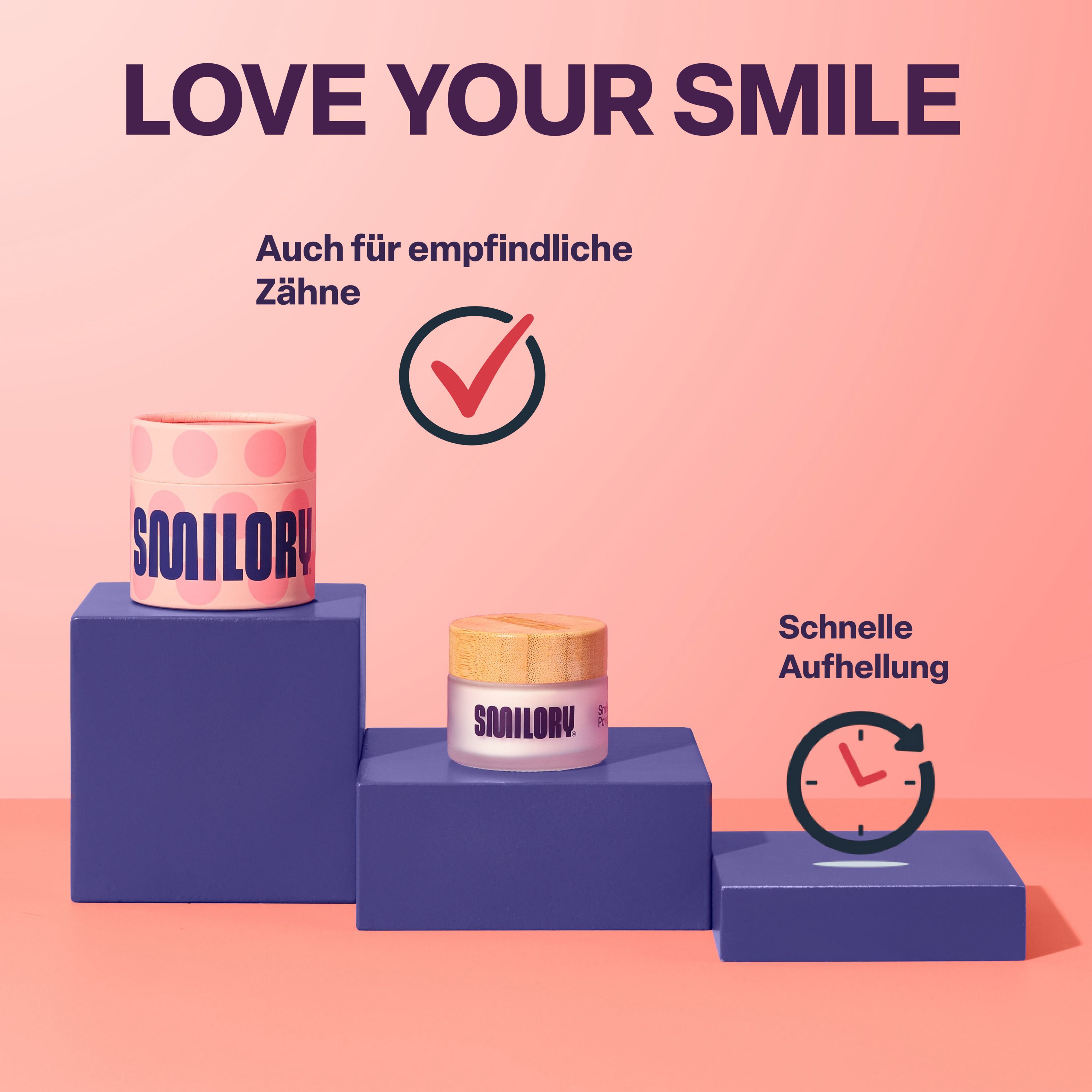 Produkt-Arrangement mit Smilory-Behältern auf blauen Blöcken. Text: Auch für empfindliche Zähne, schnelle Aufhellung.