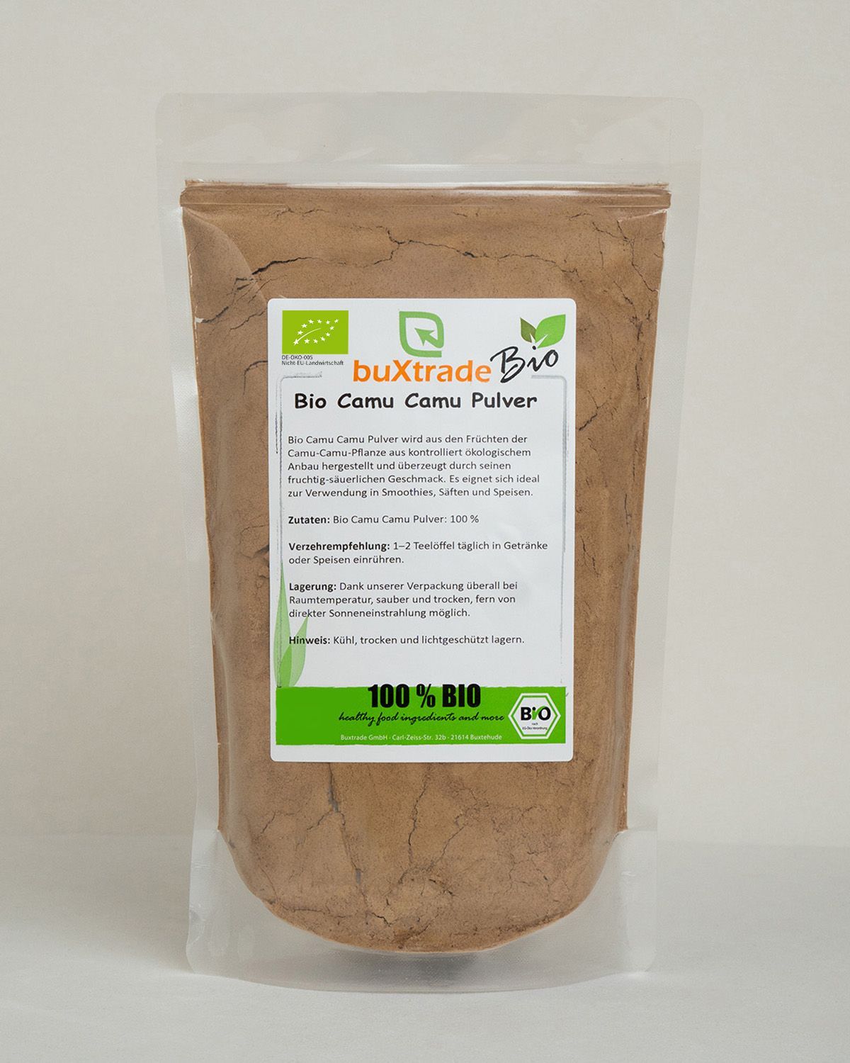 Buxtrade Bio Camu Camu Pulver in einem Standbodenbeutel mit Bio-Siegel und Hinweisen zur Lagerung und Anwendung.