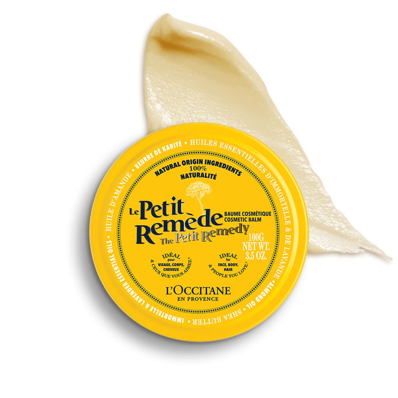Gelbe Dose "Le Petit Remède" mit cremiger Substanz daneben. Text: "Baume cosmétique", "100% naturalité", "L'Occitane".