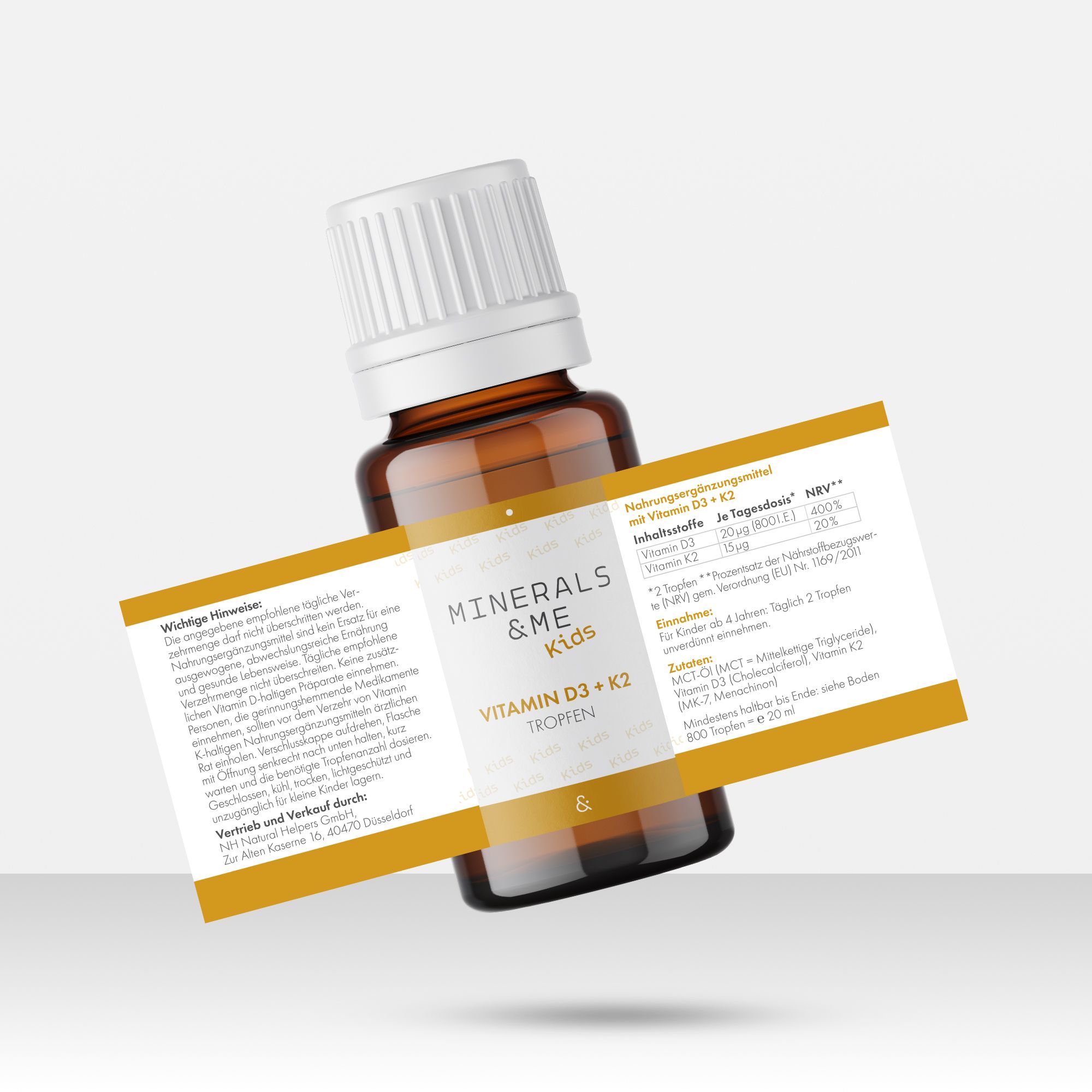 Braune Glasflasche mit Etikett. Aufschrift MINERALS & ME Kids Vitamin D3 + K2 Tropfen. Nährwertangaben. Text.