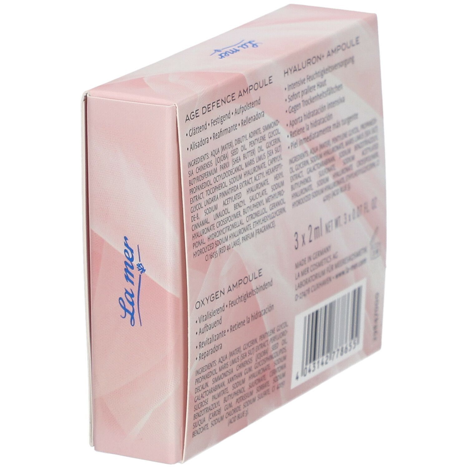 Schräg gestellte, rosa Verpackung mit Produktinformationen. Text: Age Defence Ampulle, Hyaluron+ Ampulle, Oxygen Ampulle. La mer Logo.