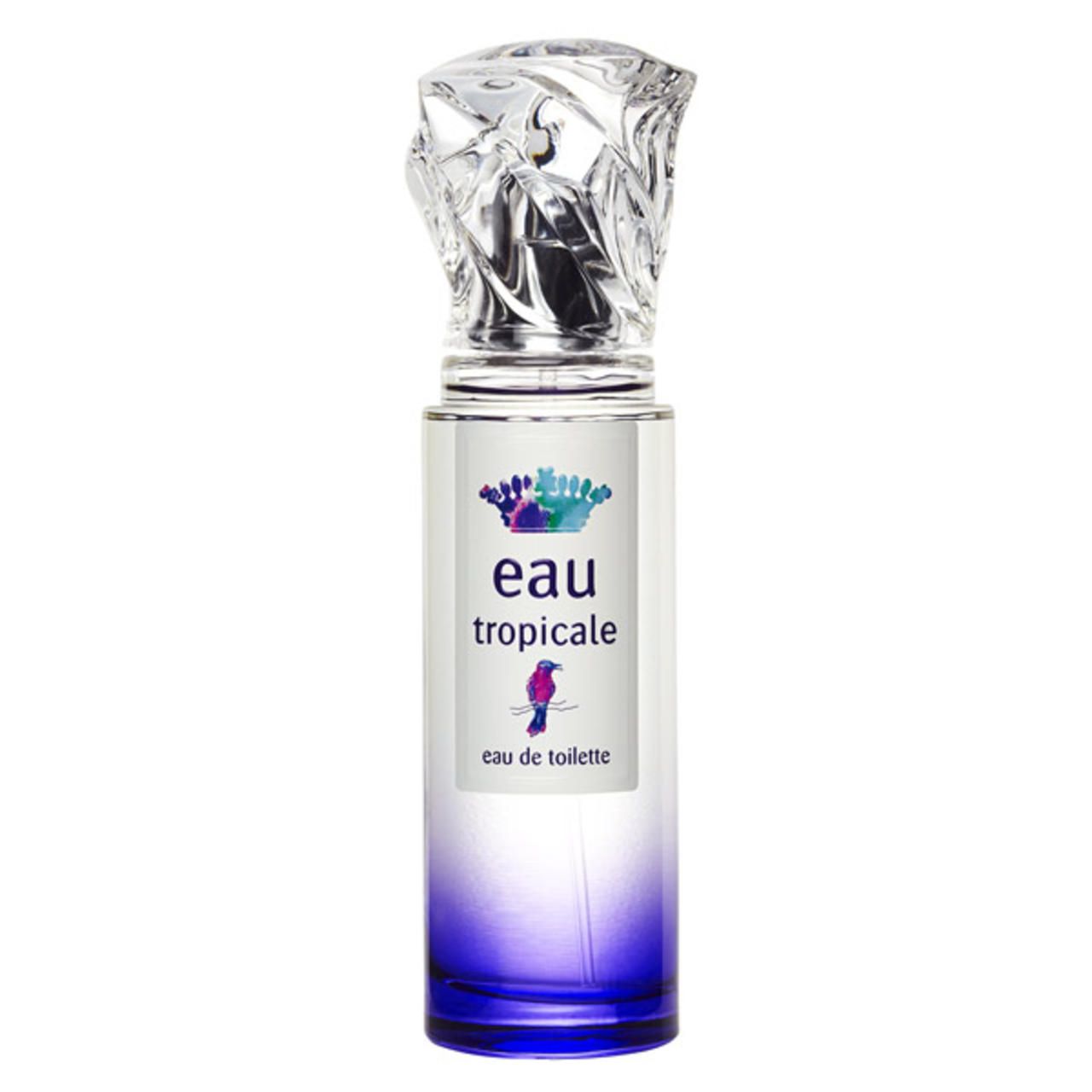 Parfümflakon mit transparentem Deckel. Aufschrift: Eau Tropicale, eau de toilette. Farbverlauf von transparent zu blau.
