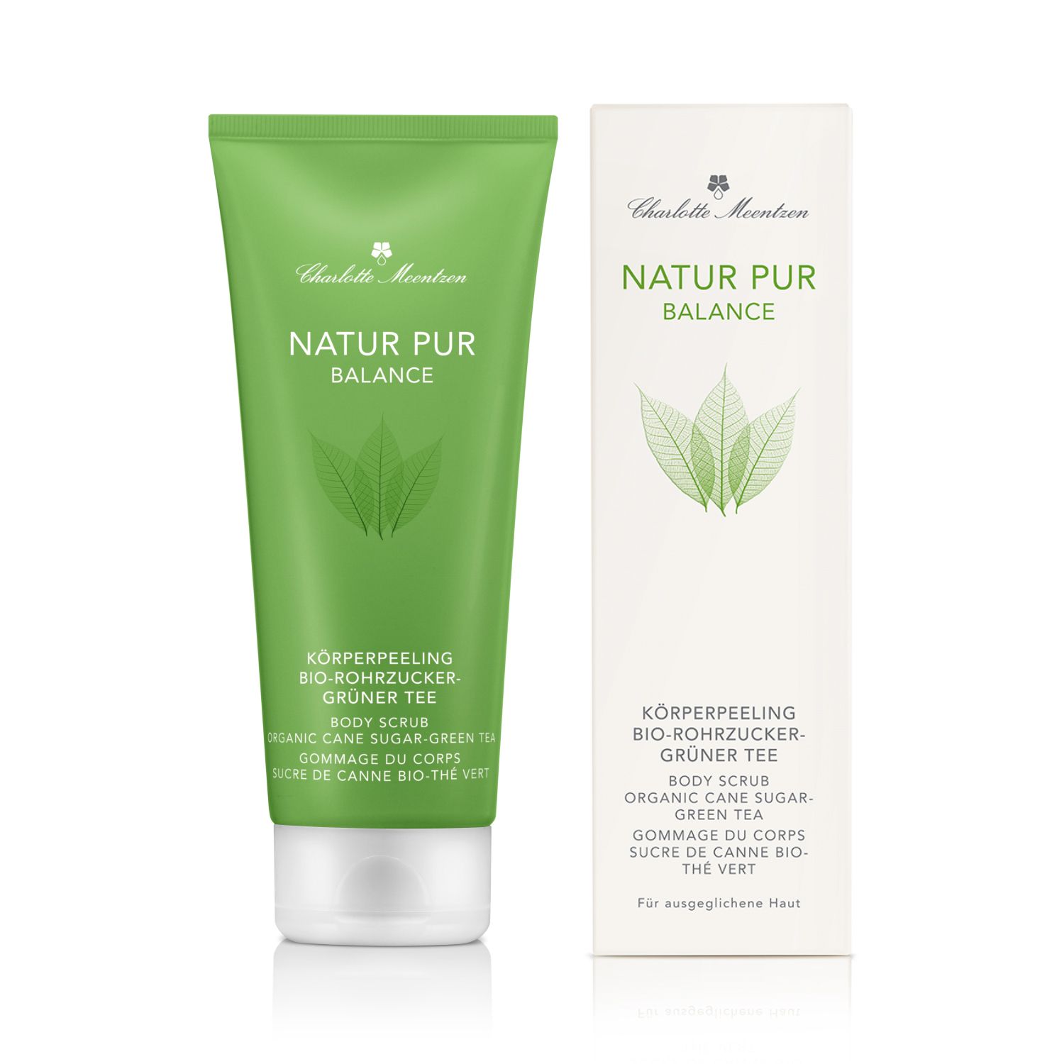 Grüne Tube und Verpackung. Text: Natur Pur Balance, Körperpeeling Bio-Rohrzucker Grüner Tee. Produkt und Verpackung nebeneinander.