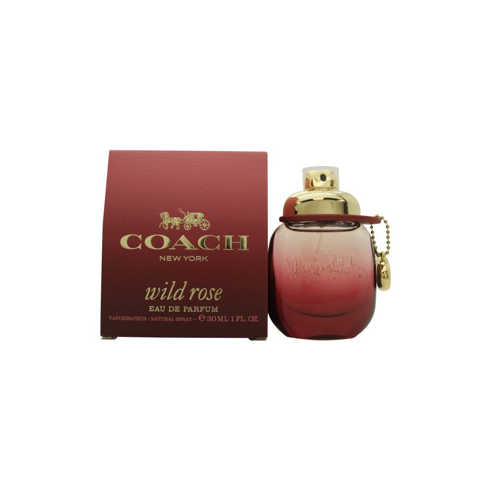 Coach Wild Rose EdP Nat. Spray. Flakon und Verpackung in Rosa. Goldfarbener Verschluss. Text: Wild Rose.