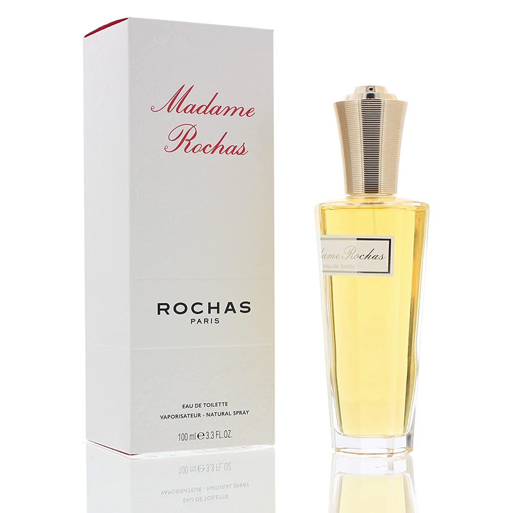 Parfümflakon und Verpackung. Flakon mit goldfarbenem Verschluss, gelber Flüssigkeit. Verpackung mit Schriftzug Madame Rochas.