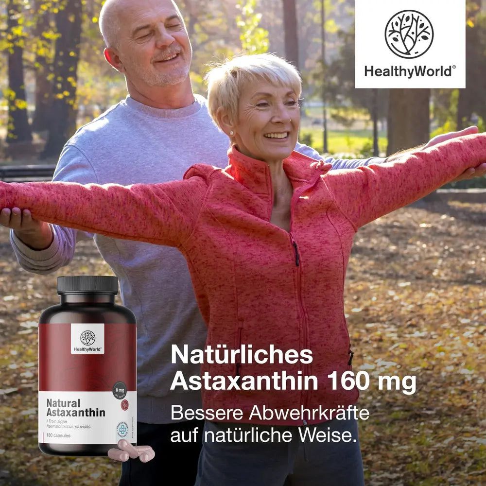 Frau und Mann im Freien. Flasche mit Kapseln. Aufschrift: Natürliches Astaxanthin 160 mg. Marke: HealthyWorld.