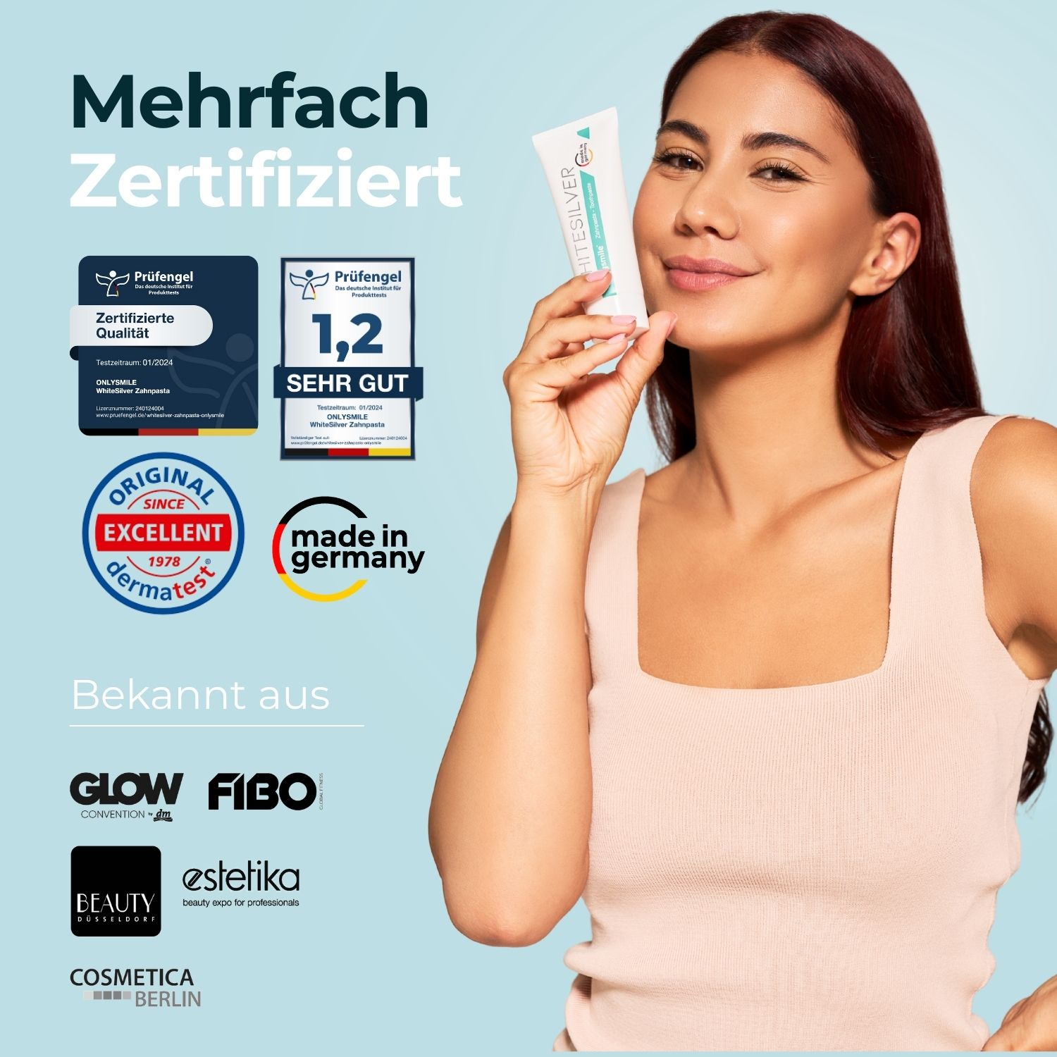 Frau hält Zahnpasta-Tube. WhiterSilver Zahnpasta. Siegel: Prüfgel, Dermatest, Made in Germany. Bekannt aus: GLOW, FIBO, BEAUTY, estelika, cosmetica.