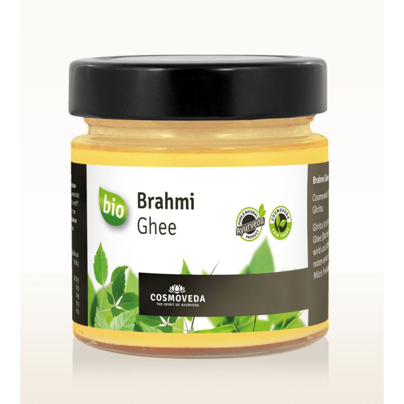 Glas mit Brahmi Ghee. Schwarzer Deckel, gelbes Produkt. Label mit "bio" und "Ayurveda" Siegeln. Marke: Cosmoveda.
