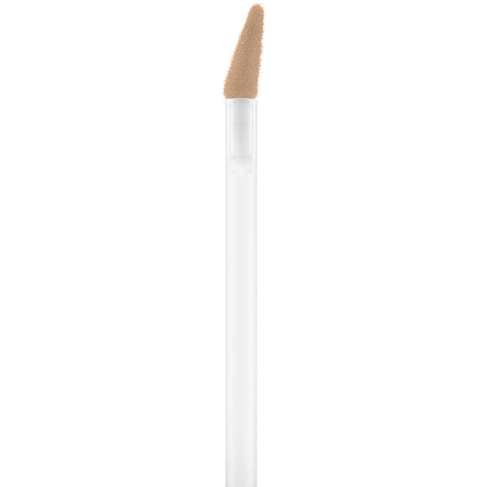 Nahaufnahme des Applikators eines Concealers. Der Applikator hat eine helle, beige Spitze.