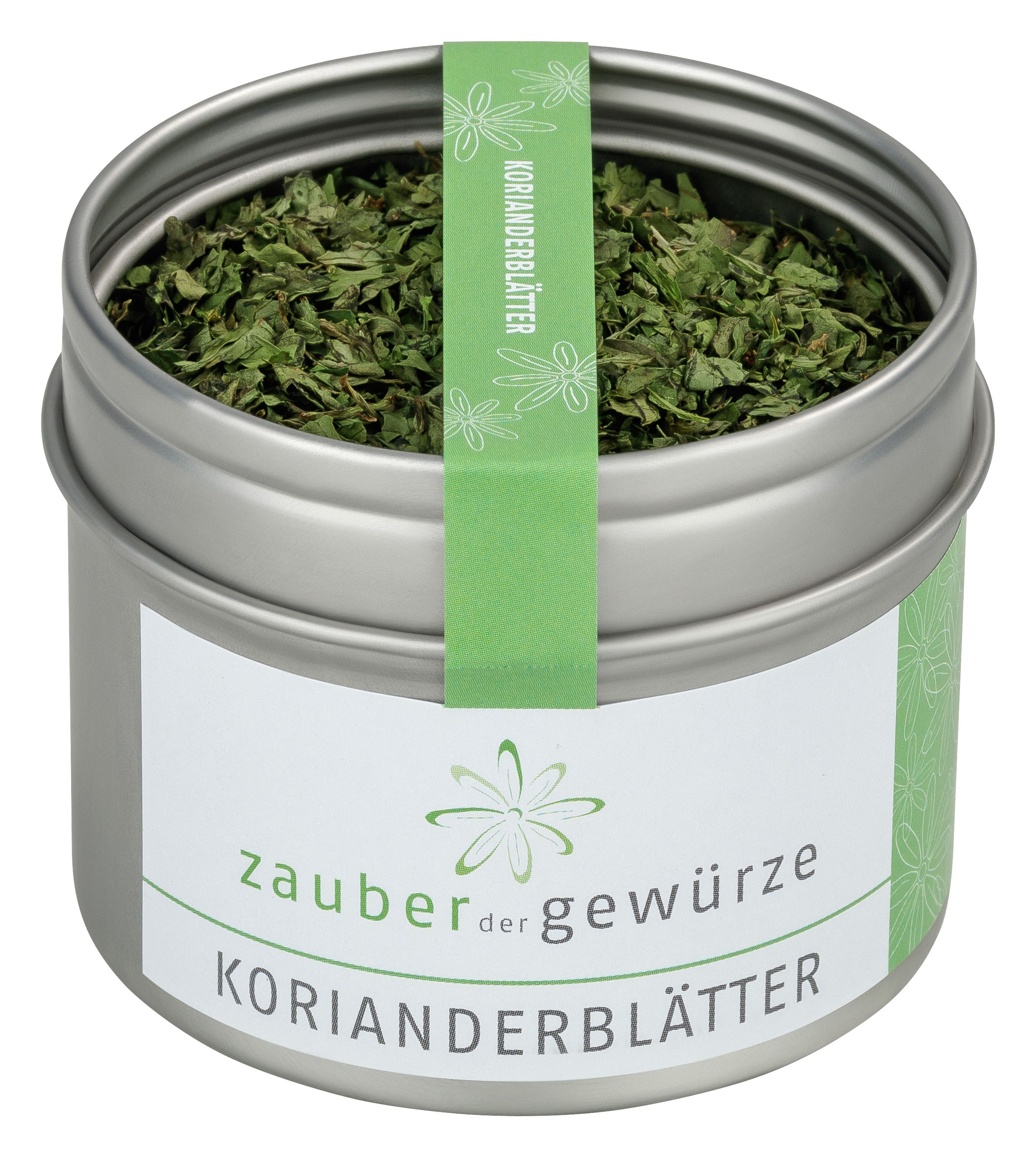 Runde Dose mit Korianderblättern. Etikett mit Schriftzug 'Zauber der Gewürze Korianderblätter'. Grüner Streifen mit Schriftzug.