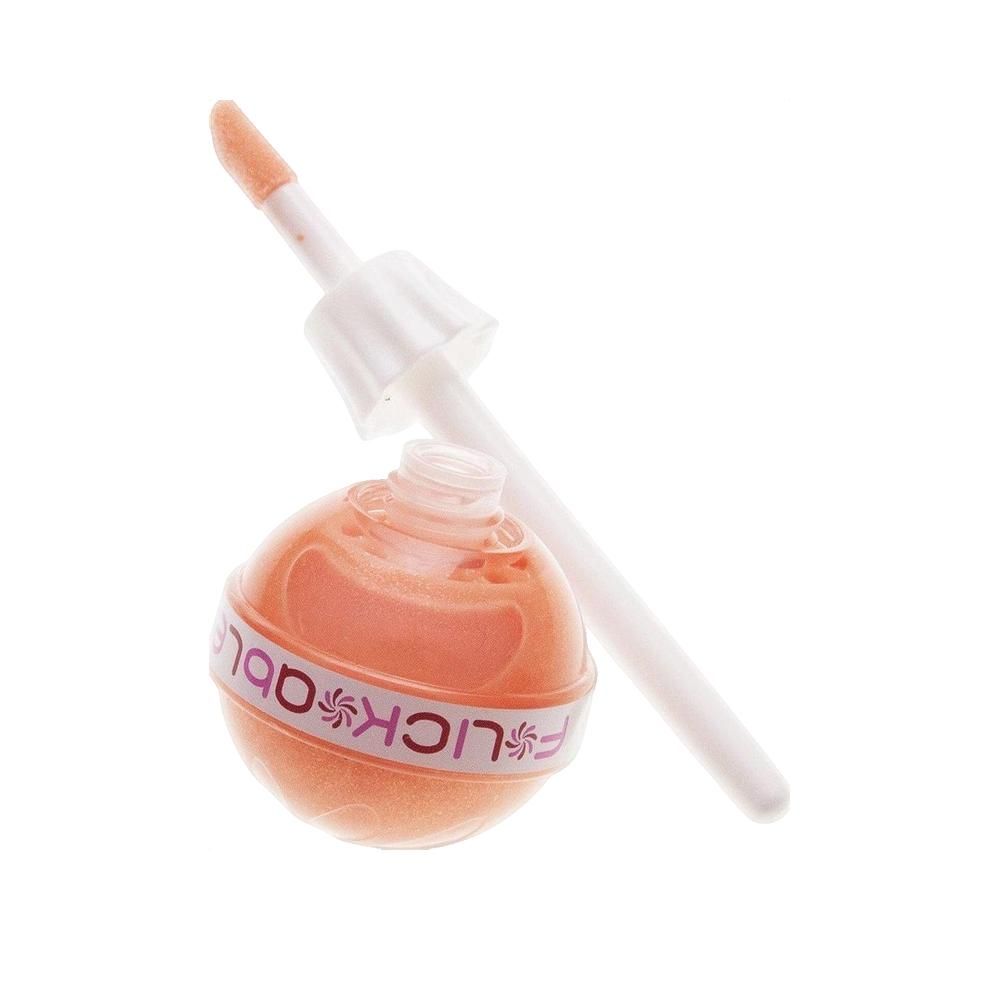 Lipgloss-Lolly, geöffnet. Kugelförmiger Behälter mit Stiel. Aufschrift: F*LICKable. Farbton: Orange.