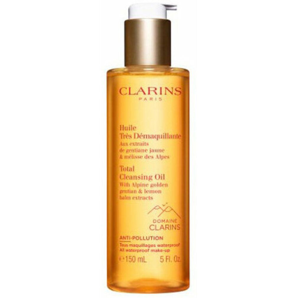 Klare Flasche mit goldfarbenem Inhalt und Dosierpumpe. Beschriftung: Clarins Total Cleansing Oil, 150 ml.