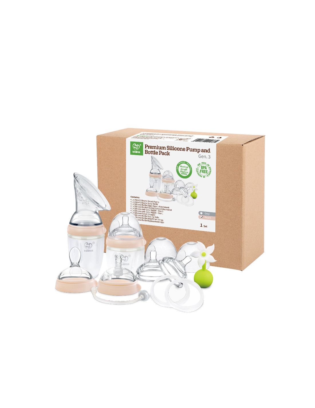 Produkt-Set in brauner Verpackung. Enthält Flaschen, Sauger, Deckel und eine grüne Kugel. Text auf der Verpackung.