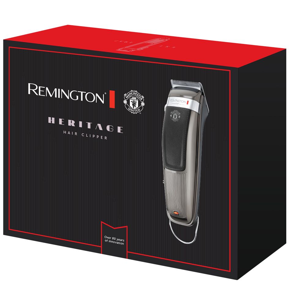 Haarschneider in Verpackung. Marke Remington Heritage. Schwarze Box mit rotem Deckel. Silberner Haarschneider mit schwarzem Griff.