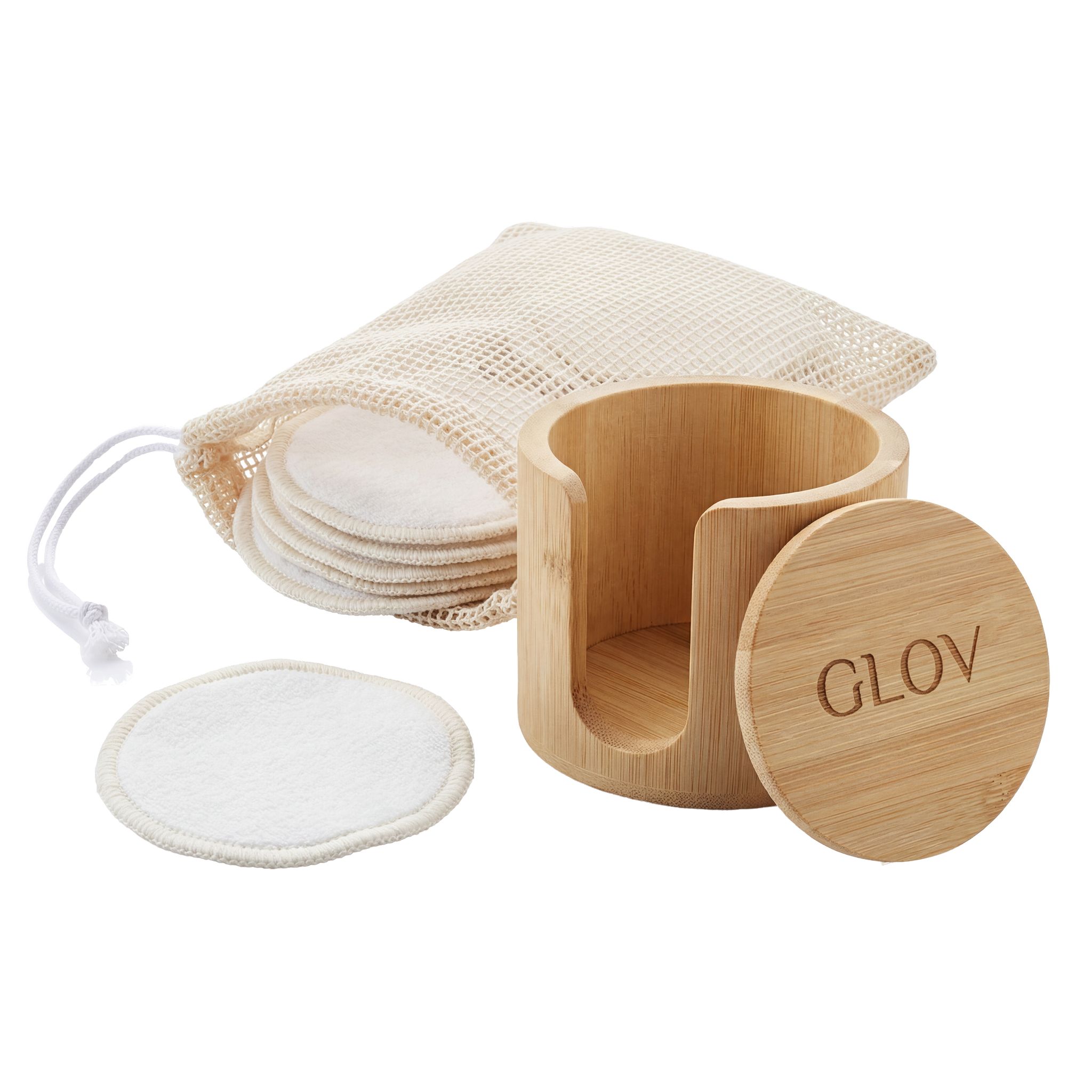 Wiederverwendbare Bambus-Pads in einem Holzständer mit Netzbeutel.