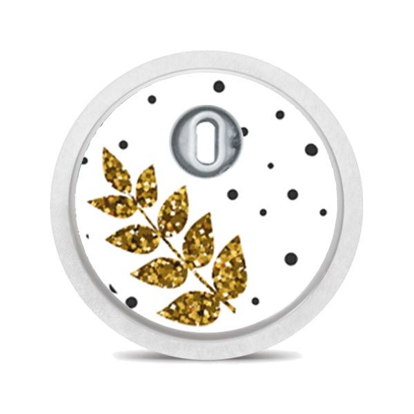 Runder Sticker mit Christbaumkugel-Motiven. Schwarze Konturen, goldene Sterne. Weißer Rand.