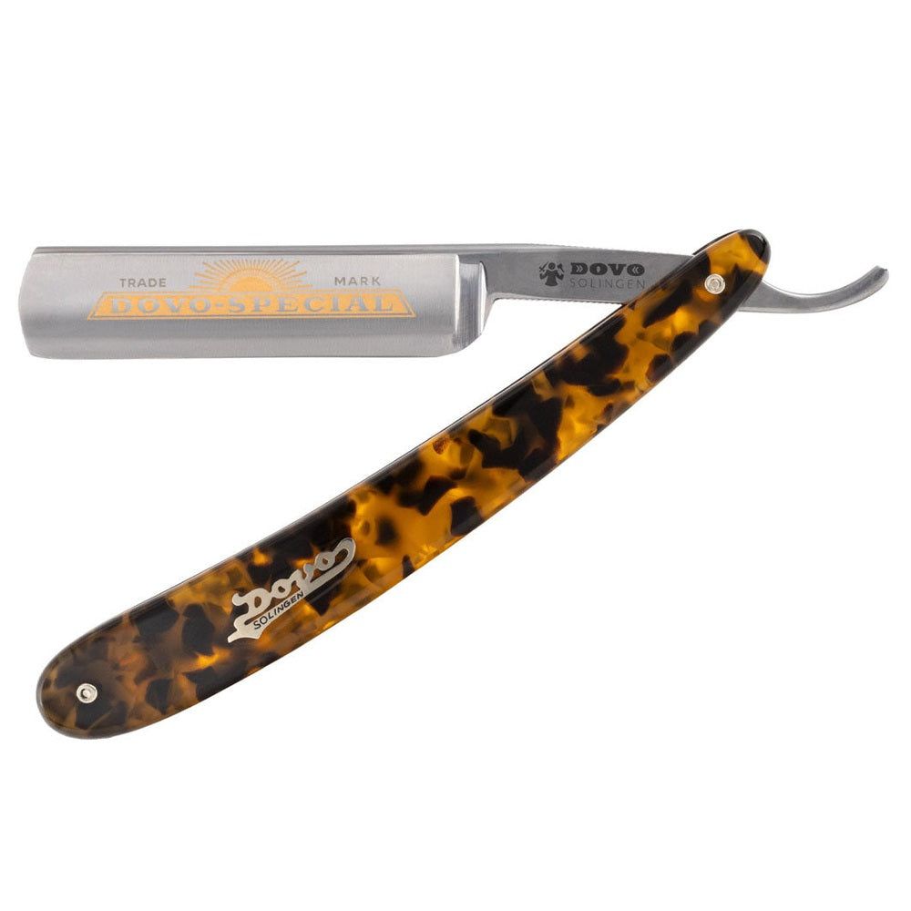Rasierer mit Griff in Schildpatt-Optik. Klinge mit Logo und Schriftzug DOVO SPÉCIAL. Auf weißem Hintergrund.