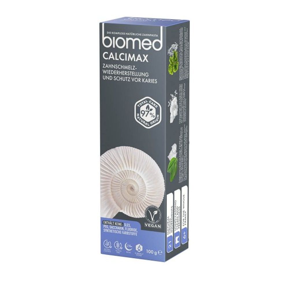 Verpackung von biomed Calcimax Zahnpasta. Dunkelgrau mit weißem Logo und Text. Vegan-Siegel. Text: Zahnschmelz-Wiederherstellung und Kariesschutz.