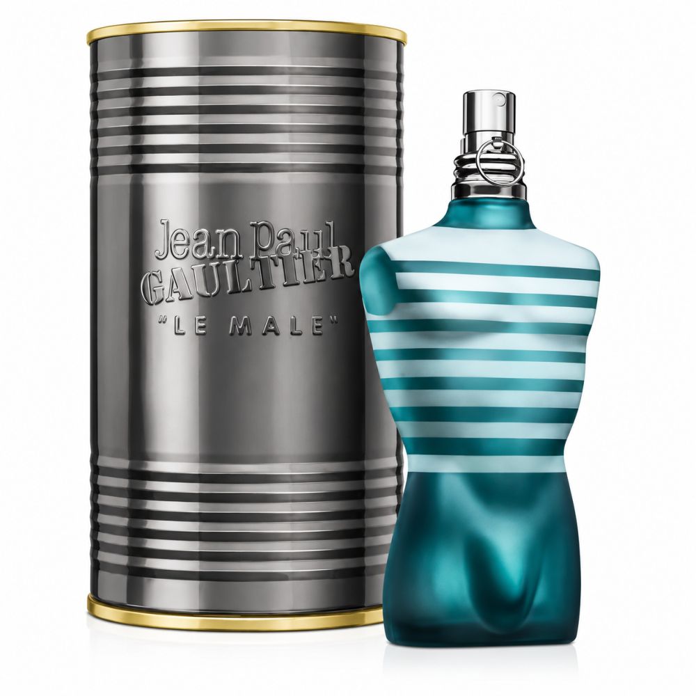 Jean Paul Gaultier Le Male Eau de Toilette Flakon neben seiner zylindrischen Metalldose mit Markenschriftzug.
