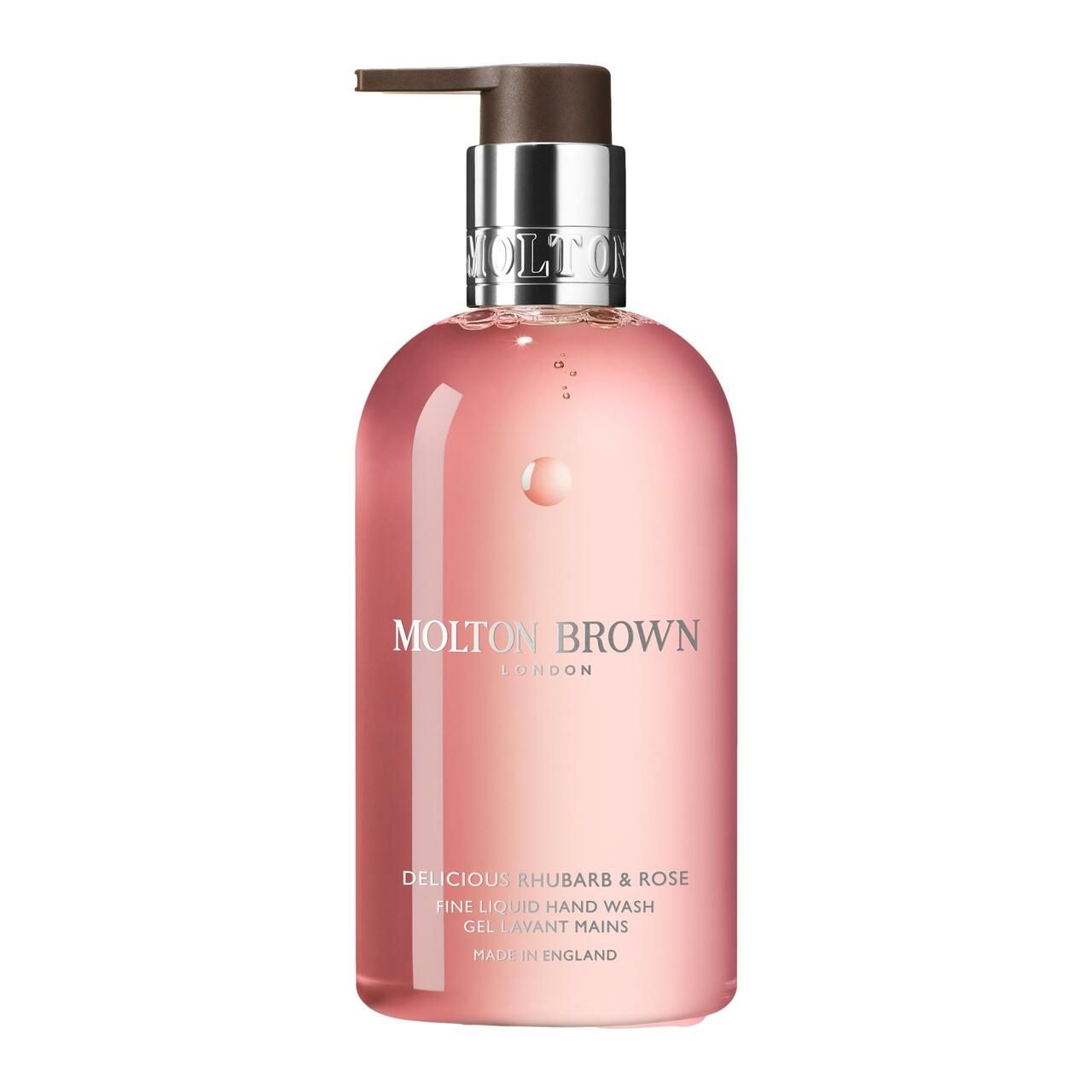Rosa Flüssigseife mit Pumpe. Aufschrift: Molton Brown, Delicious Rhubarb & Rose. Hergestellt in England.