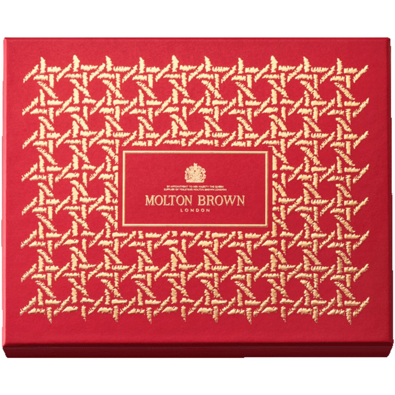 Rote Geschenkbox mit goldenem Muster und Logo von Molton Brown London.