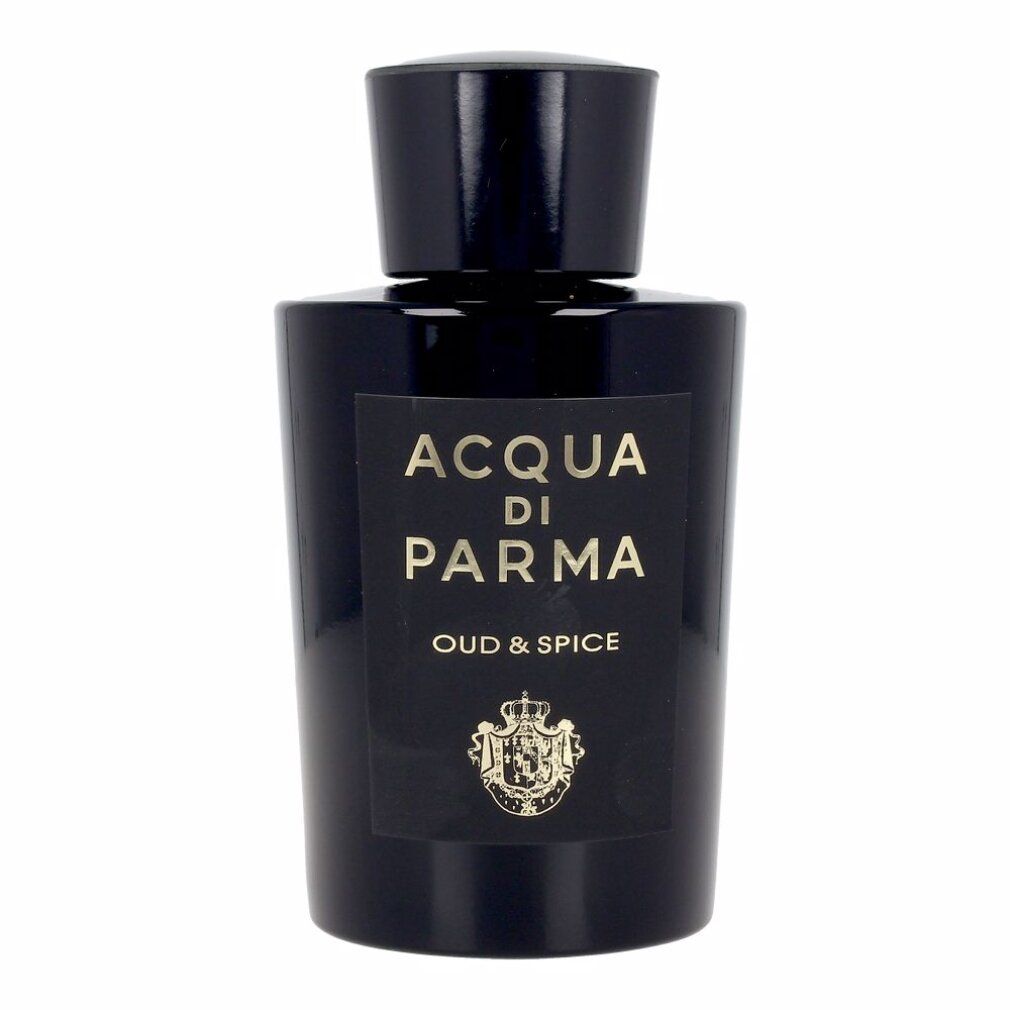 Schwarze Flasche mit Etikett. Aufschrift: ACQUA DI PARMA, OUD & SPICE. Goldfarbenes Wappen.