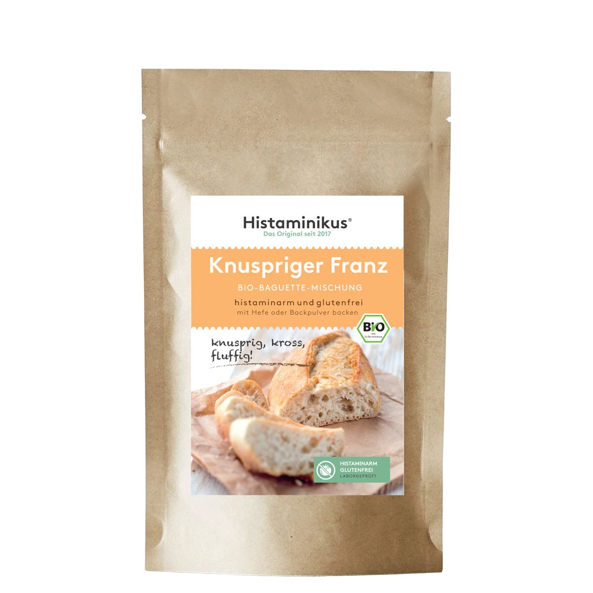 Braune Papiertüte mit Etikett. Auf dem Etikett: "Histaminikus Knuspriger Franz", Bio-Baguette-Mischung, histaminarm und glutenfrei. Abbildung von Brot.