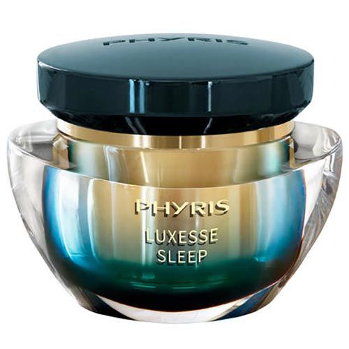 Glasbehälter mit blau-grüner Flüssigkeit und schwarzem Deckel. Goldfarbener Ring. Aufschrift: PHYRIS LUXESSE SLEEP.