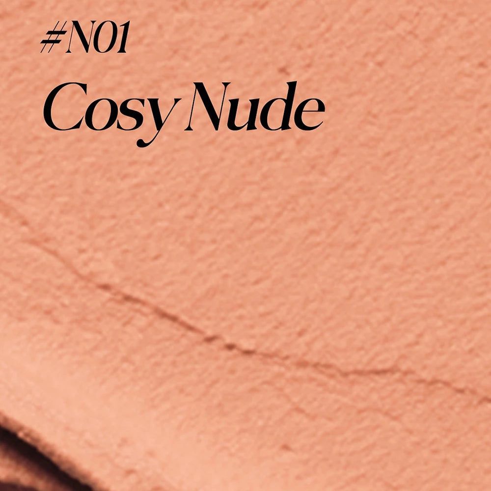 Text '#N01 Cosy Nude' auf einem pfirsichfarbenen Hintergrund.
