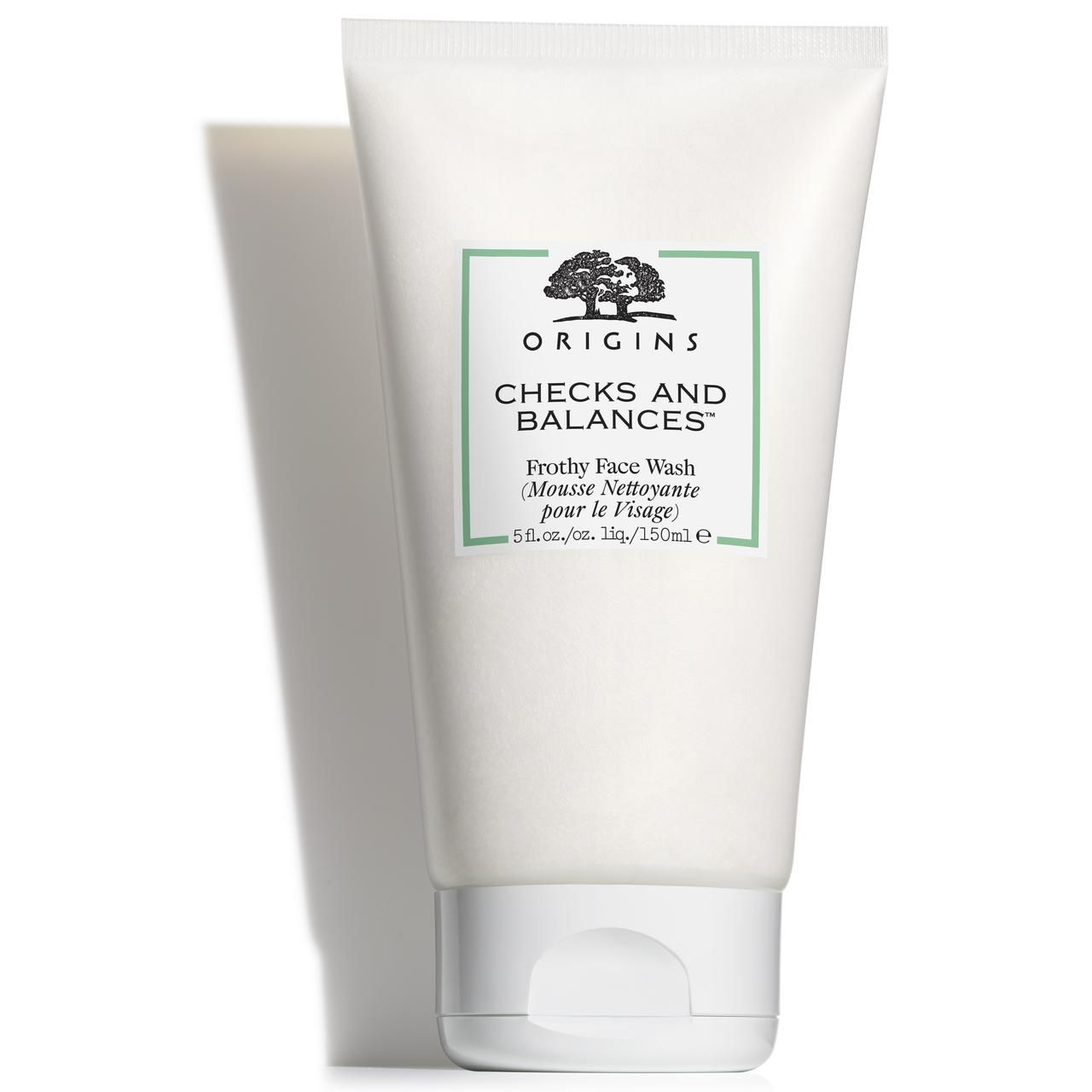 Weiße Tube mit grünem Etikett. Aufschrift: ORIGINS, CHECKS AND BALANCES, Frothy Face Wash. 150ml.