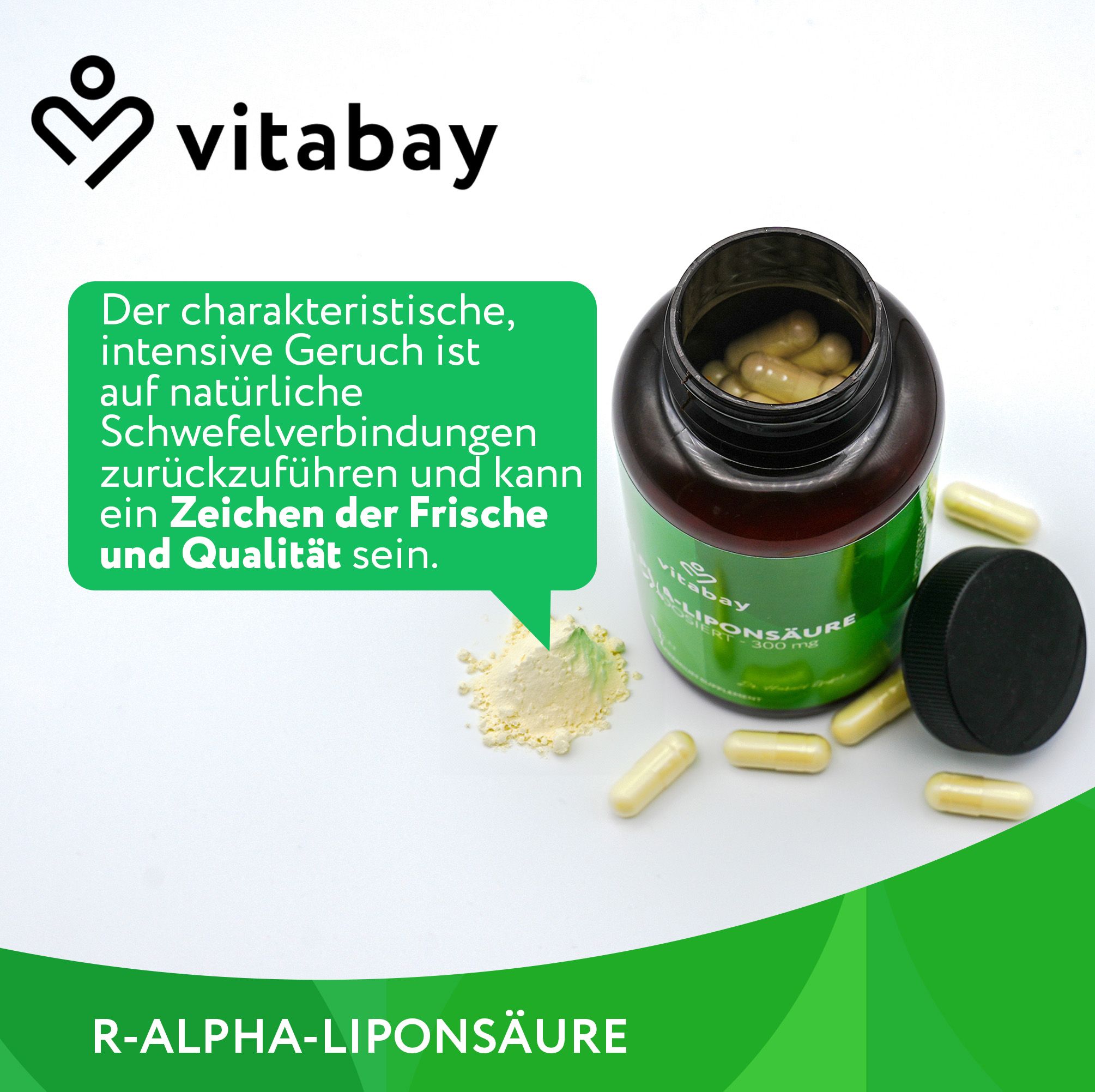 Geöffnete Flasche mit Kapseln und Pulver. Text: R-ALPHA-LIPONSÄURE. Vitabay Logo. Text: Der charakteristische, intensive Geruch...