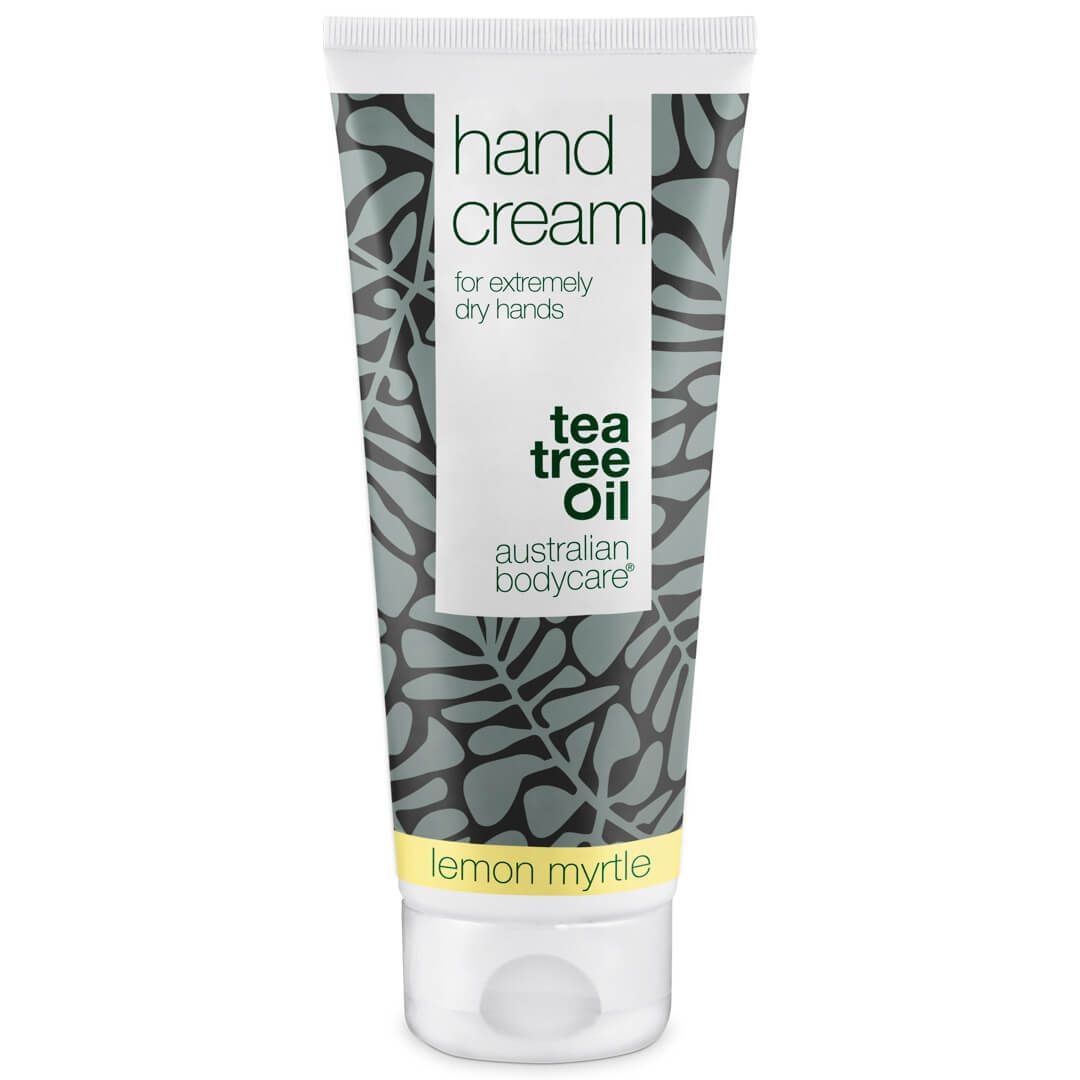 Handcrèmetube met 'Hand Cream' en 'Tea Tree Oil'.
