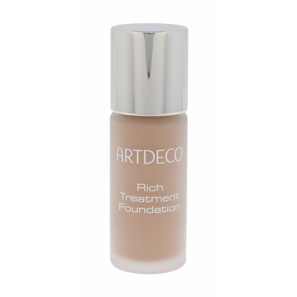 Artdeco Rich Treatment Foundation. Flasche mit Produkt. Helles Beige. Silberner Deckel. Schriftzug.