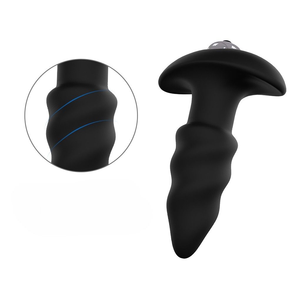 Schwarzer Analvibrator mit pilzförmigem Kopf und geriffelter Basis. Vergrößerte Detailansicht der Basis.