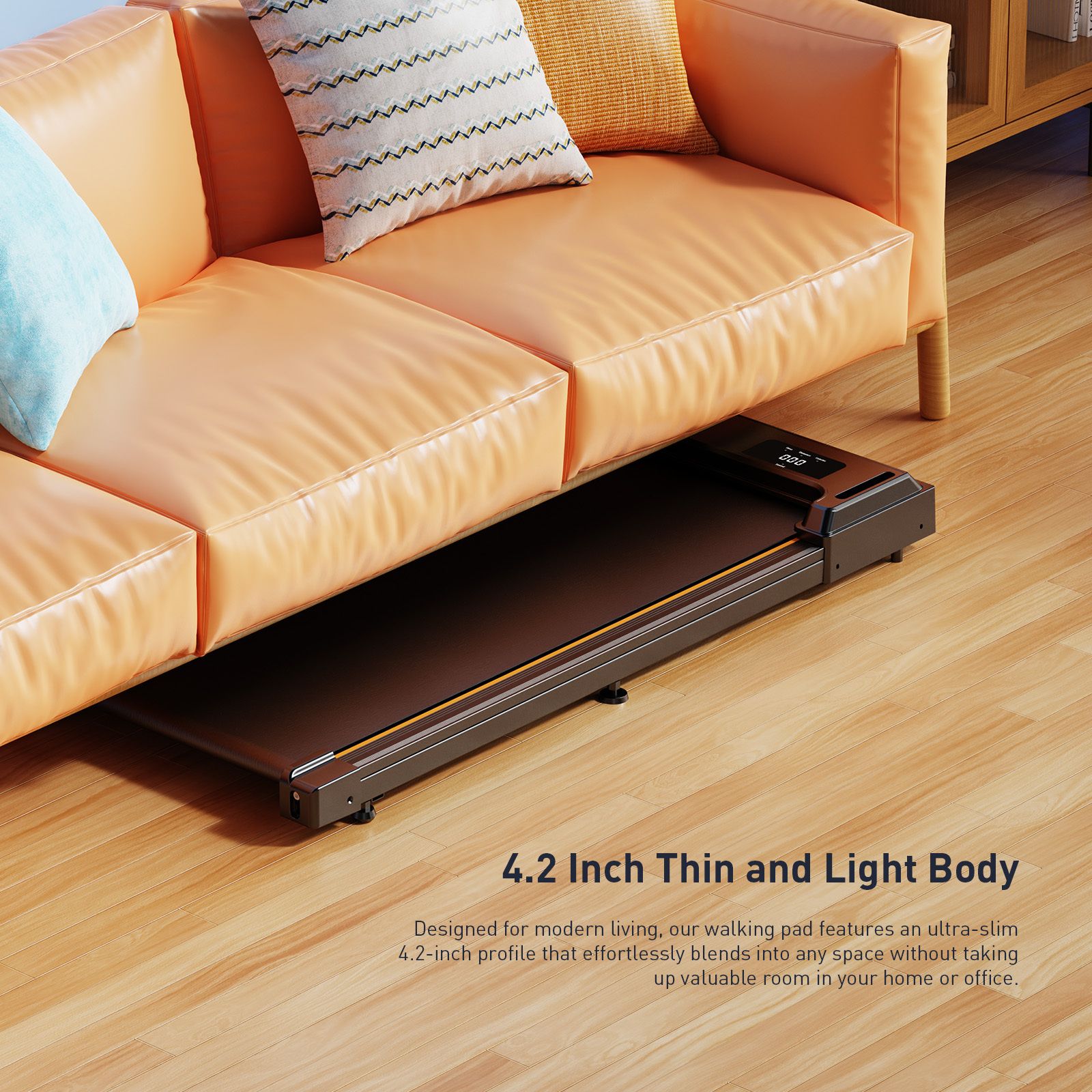 Schwarzes Laufband unter einem Sofa. Beschriftung: 4.2 Inch Thin and Light Body.
