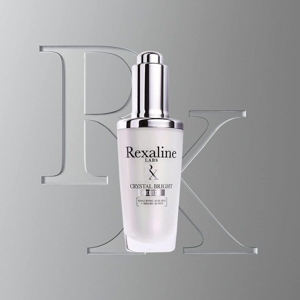 Serumflasche mit Pipette, Rexaline-Logo und Crystal Bright Serum-Schriftzug, vor transparentem Hintergrund.