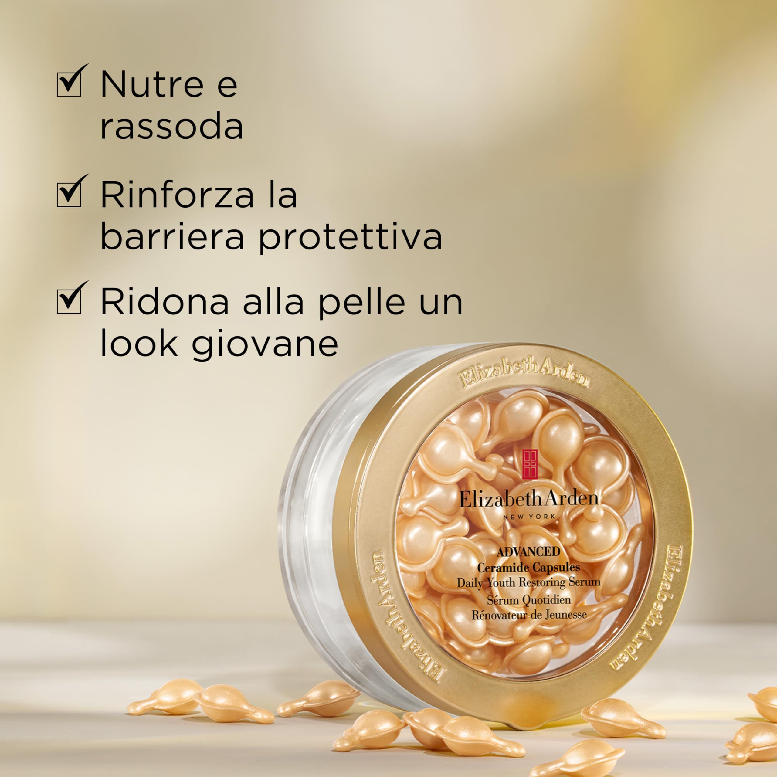 Goldfarbene Dose mit Serumkapseln. Aufschrift: Elizabeth Arden, Advanced Ceramide Capsules, Daily Youth Restoring Serum. Text in italienischer Sprache.