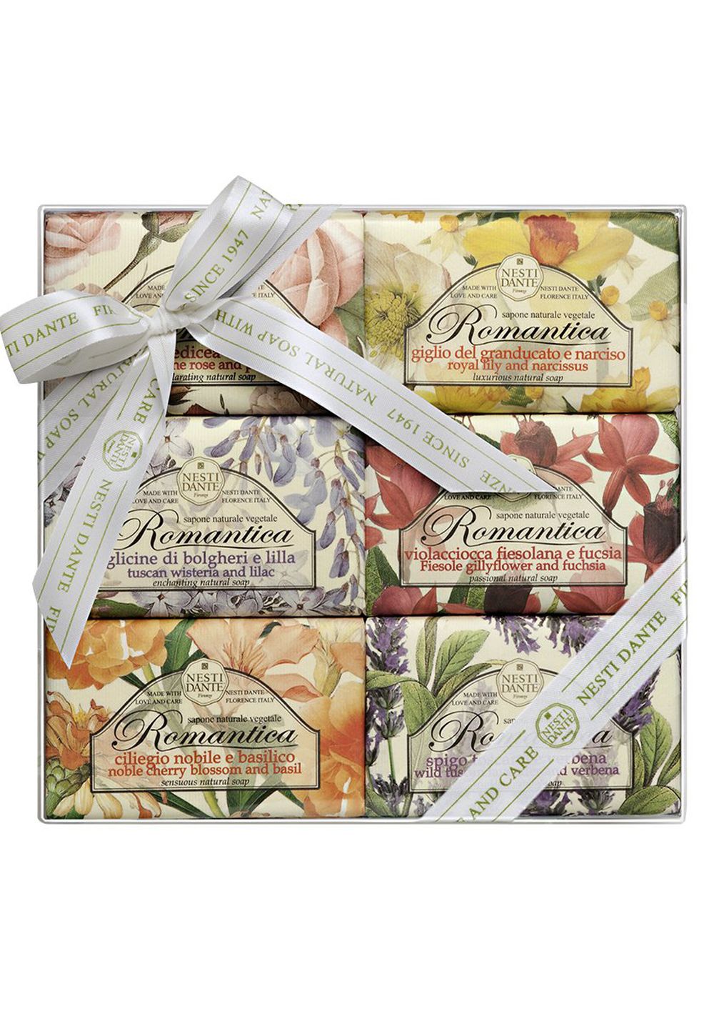 Nesti Dante Romantica Seifen-Set: Sechs Seifen mit floralen Designs, gebunden mit Band.