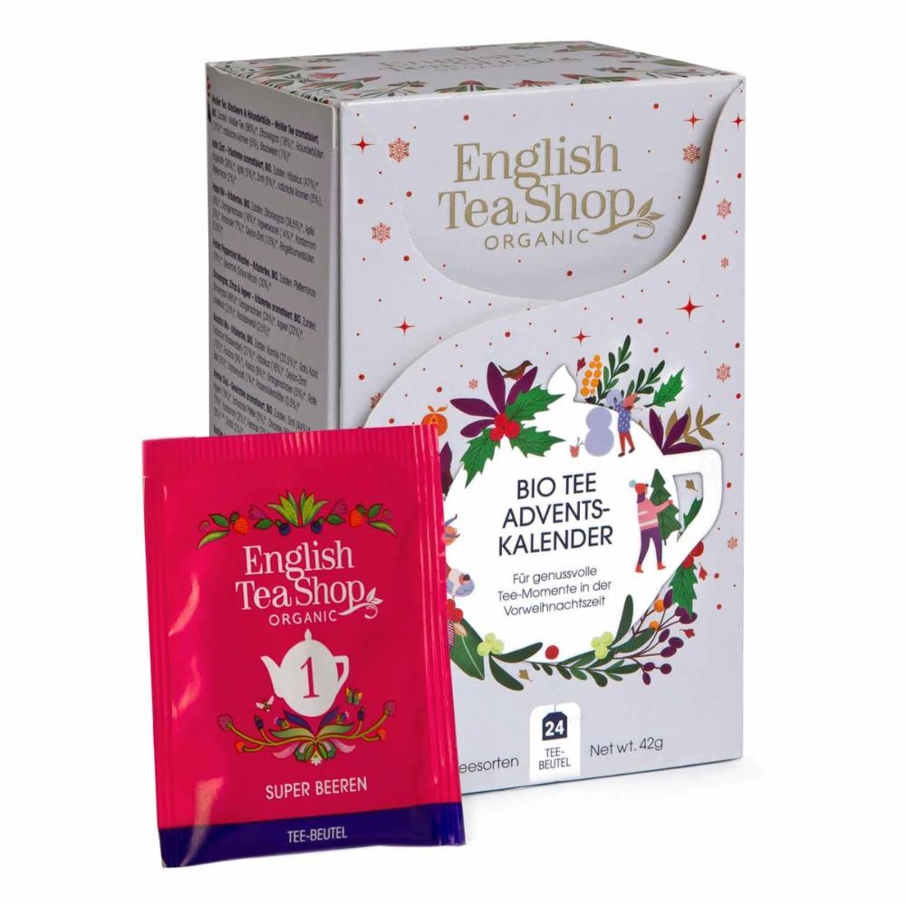 Verpackung mit 24 Teebeuteln. Marke: English Tea Shop. Aufdruck: Bio Tee Adventskalender. Einzelner Teebeutel mit Aufdruck "1 Super Beeren".