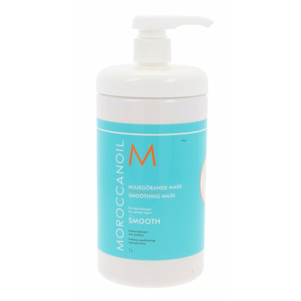 Weißer Behälter mit blauem Etikett. Aufschrift: Moroccanoil, Mjukgörande Mask, M. Mit Pumpe.