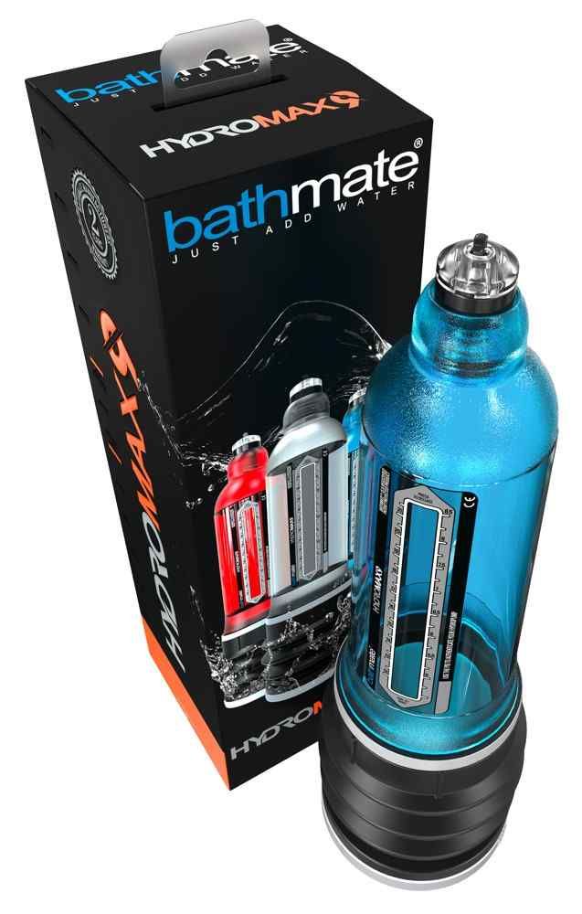 Hydromax9, blauer Zylinder mit schwarzem Faltenbalg, neben Verpackung. Verpackung mit Produktabbildung und Schriftzug.