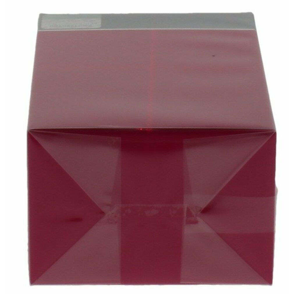 Rote Verpackung, von oben betrachtet. Durchsichtige Folie umhüllt die Verpackung. Falten und Klebestreifen sichtbar.