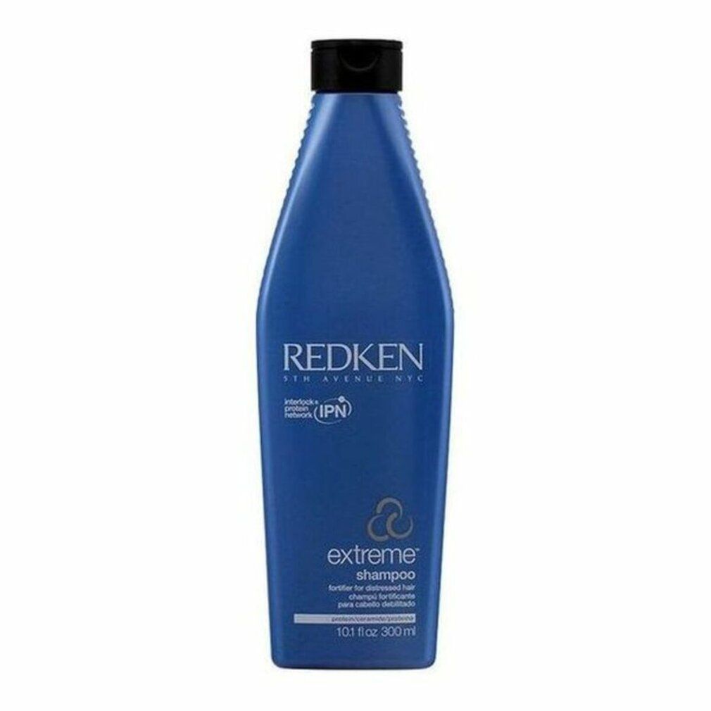Blaue Shampoo-Flasche mit schwarzem Deckel. Aufschrift: Redken, Extreme Shampoo. Enthält IPN. 10.1 fl oz.