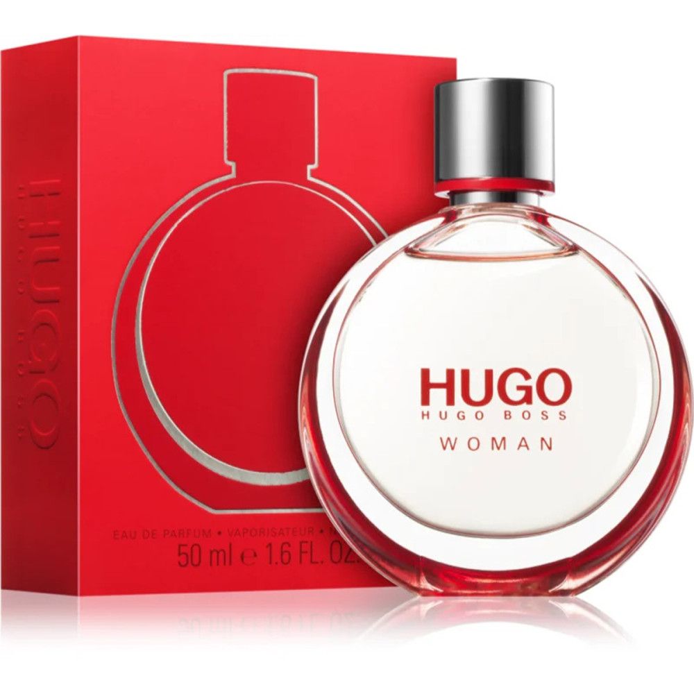 Roter Karton und runde Flasche. Aufschrift HUGO BOSS WOMAN. Flasche mit silbernem Verschluss. 50 ml.