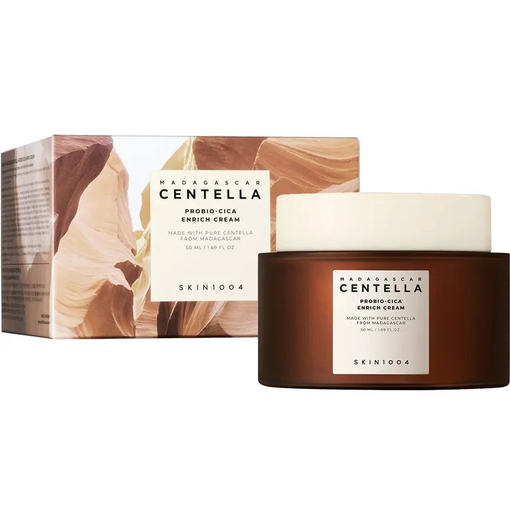 Cremetiegel und Verpackung. Brauner Tiegel, weißer Deckel. Verpackung mit Landschaftsmotiv.