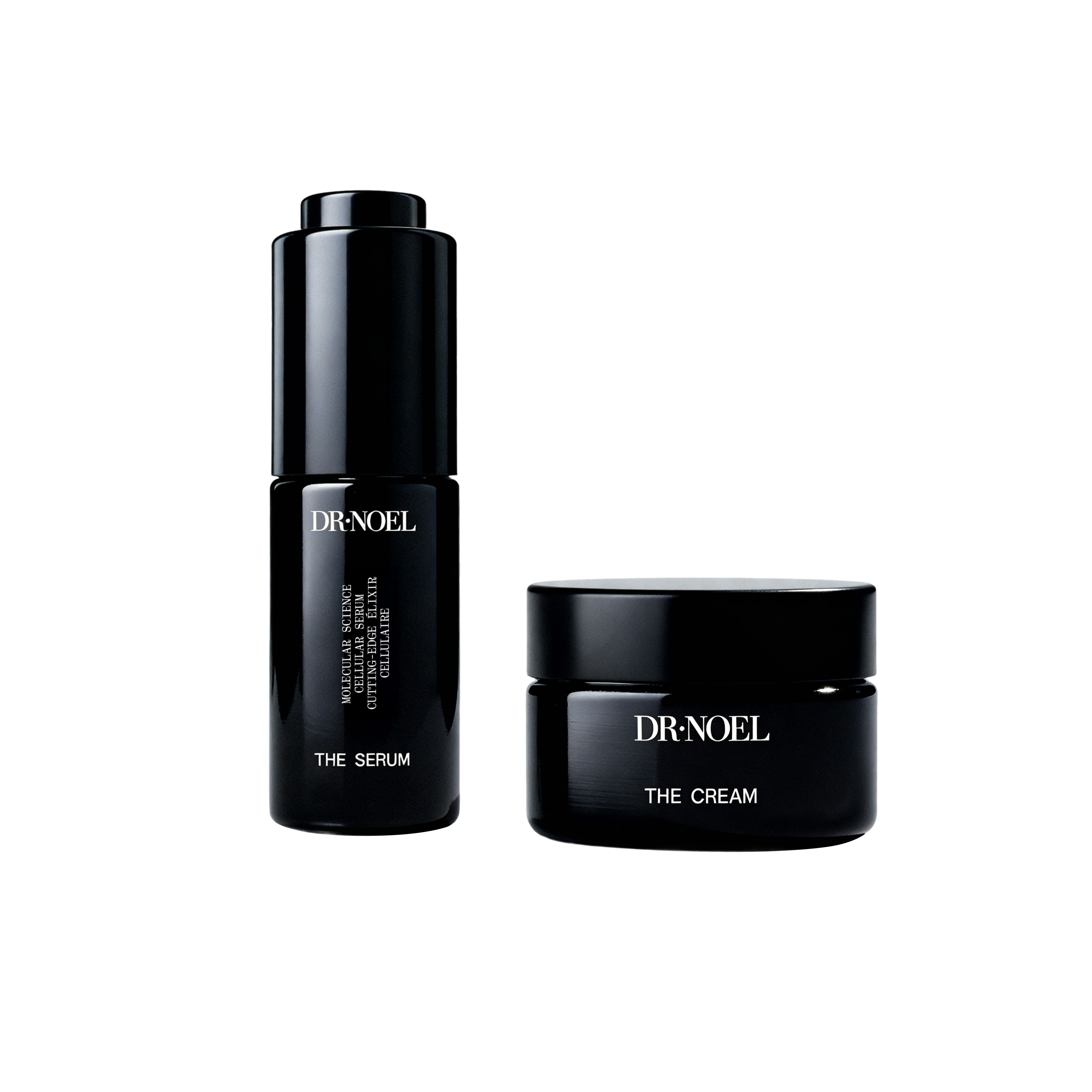 Zwei schwarze Flaschen. Eine Serumflasche mit Aufschrift "DR. NOEL" und "THE SERUM". Eine Creme-Dose mit "DR. NOEL" und "THE CREAM".
