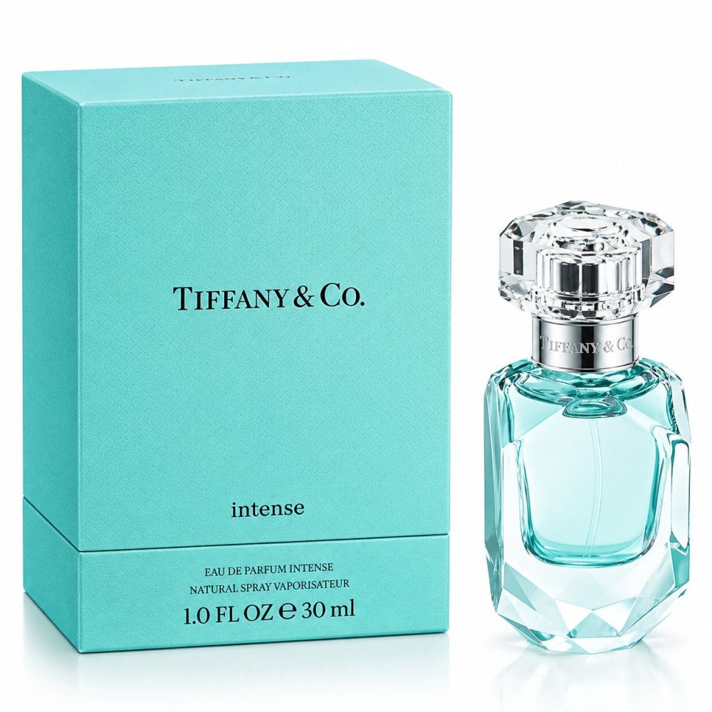Tiffany & Co. Intense Eau de Parfum Flakon und Karton. Hellblaue Verpackung, klarer Glasflakon mit silbernem Etikett und facettiertem Verschluss.