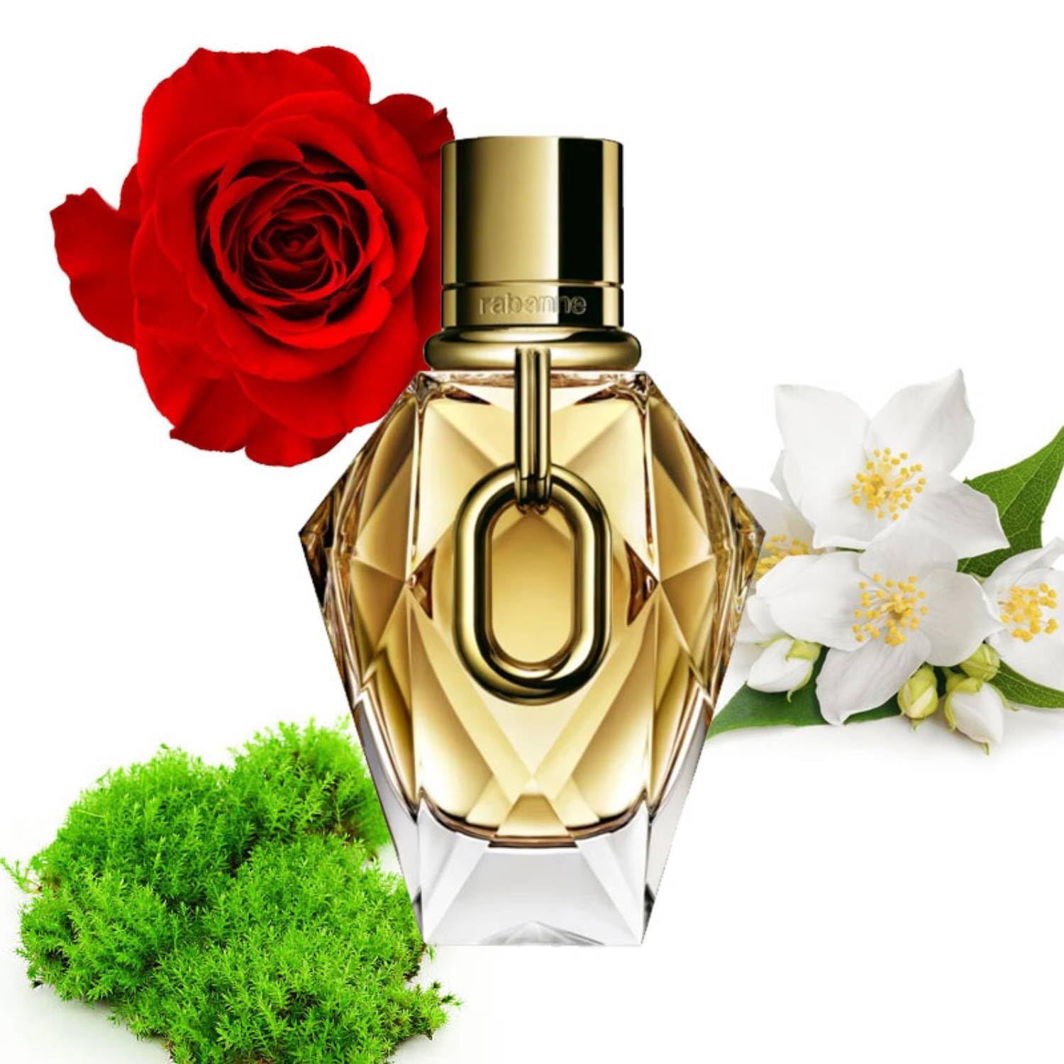 Paco Rabanne Flakon mit goldenem Verschluss. Dekoration mit Rose, Jasminblüten und Moos. Goldfarbener Flakon.