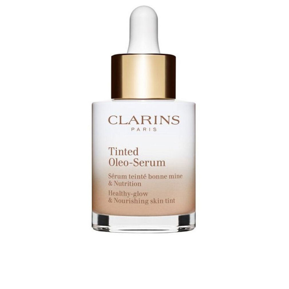 Clarins Tinted Oleo-Serum Flasche. Weißes Glas, goldener Deckel, Produktbezeichnung und Text.